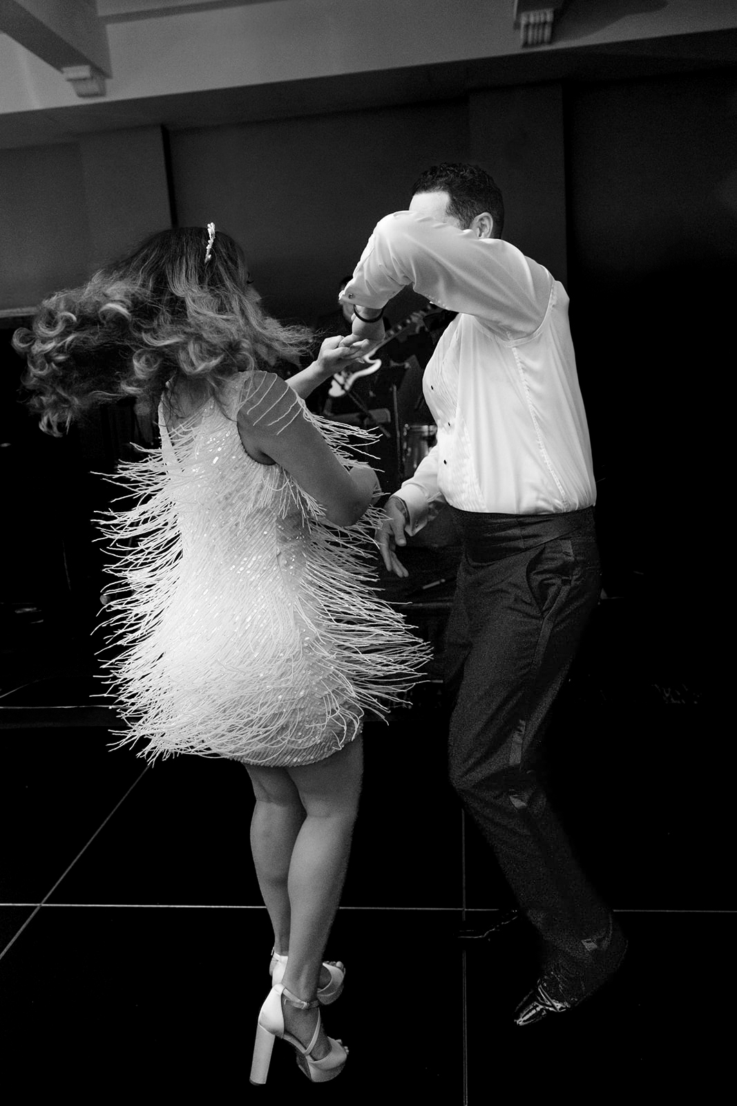 Wedding reception at the Hotel Washington in DC, couple dancing in a vibey black and white edit
